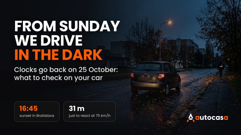 Autumn evening in a town, a car with its lights on wet asphalt covered in leaves and a pedestrian with a reflective strip at the roadside